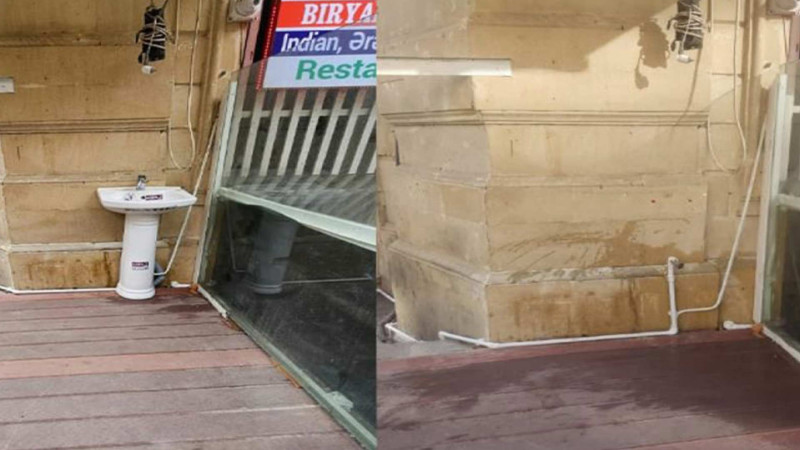 Paytaxtda tarixi binaya bərkidilmiş əlüzyuyan sökülüb