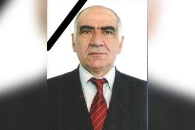 Azərbaycanda universitet müəllimi oğlunun qəbri üstündə vəfat edib