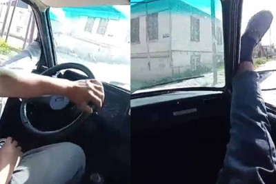 Ayaqlarını pəncərədən çıxaran sürücü və sərnişin həbs edildilər