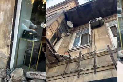 Bakıda binanın balkonu uçub