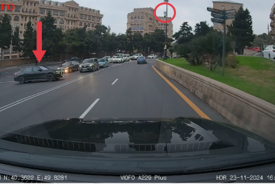 AA nömrəli "BMW"nin sürücüsü kameranın altında qanunu pozdu - VİDEO