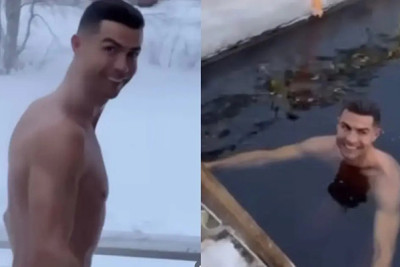 Qarlı havada buzlu suya girdi - VİDEO