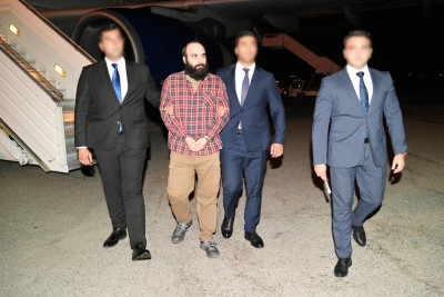 DTX dövlətə xəyanət etməkdə təqsirləndirilən Azər Bağırovu İordaniyadan Azərbaycana gətirib - FOTO